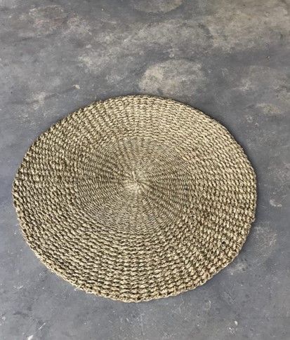 Light tan round rug
